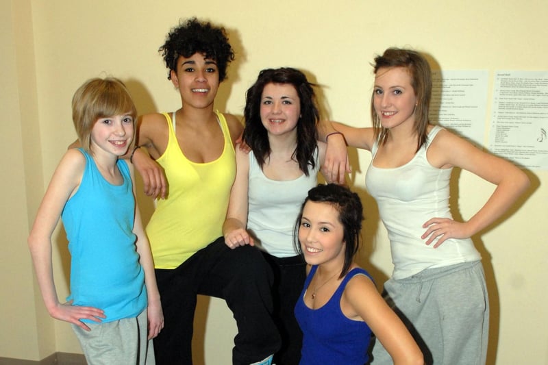 The 'Flip Switch' dancers from MADS! get ready for the concert in 2010.