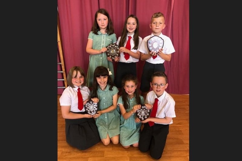 Pictured are prize-winners from P4 at Donacloney Primary School near Lurgan, Co Armagh. Back Row: Robyn Beattie, Abigail McCullough, Sascha McCullough. Front Row: Sarah Morrow, Evelyn Simpson, Anna Rankin, Jacob Bray.