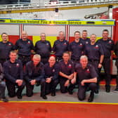 Larne's NIFRS crew are thanked for supporting the Poppy Appeal.