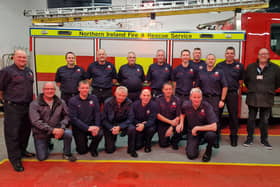 Larne's NIFRS crew are thanked for supporting the Poppy Appeal.