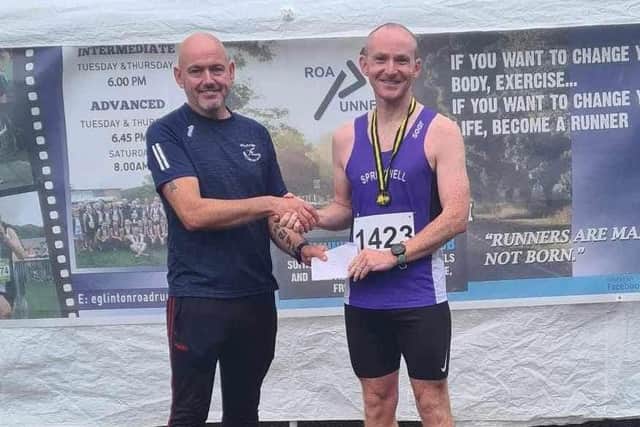 Christopher McNickle - winner of the Eglinton RR 5k (presentation made by Shane McCormack (Chair of Eglinton Road Runners). Credit David McGaffin