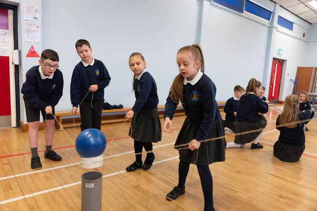 Pupils at Ballymacash Primary School try out some experiments with Thales Alenia Space, a global space manufacturer with facilities in Belfast. Pic credit: Thales Alenia Space