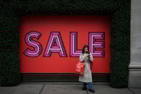 A shopper on Oxford Street, London, during the Boxing Day sales