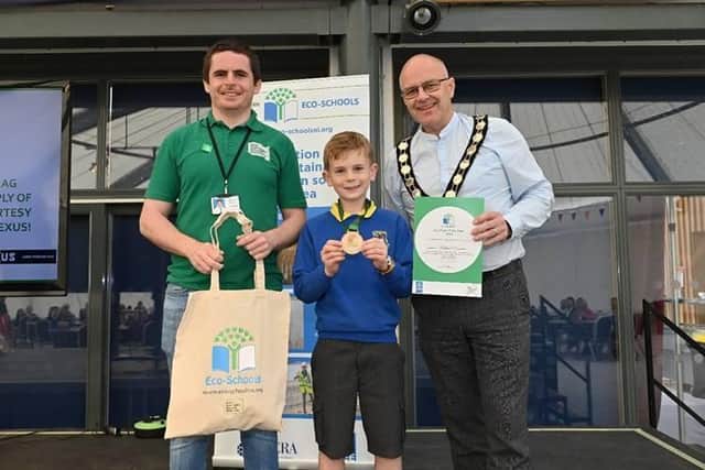 Mid Ulster’s Eco-Pupil of the Year, Ben McQueen from Donaghey PS, with Chair of Mid Ulster District Council, Dominic Molloy and Keep Northern Ireland Beautiful Field Officer Peter McErlean.