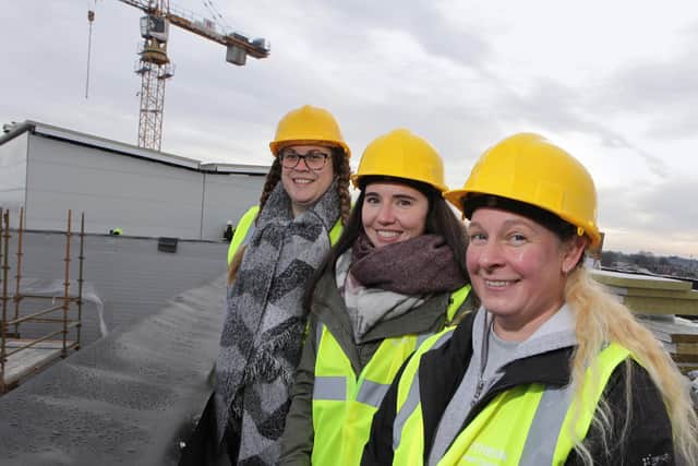 Northern Regional College staff members Claire McPhee, Sarah Ballantine and Gillian McCaw taking in the Coleraine skyline from the top of the new campus building.