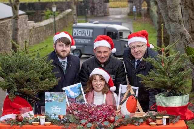 Pictured at the launch of the Royal Hillsborough Christmas Market are (l-r), Cllr Aaron McIntyre, Chair of Leisure and Community Development; Andrew Mulholland, Pig Out; Becky Watts, Watts Illustration and Alderman Allan Ewart MBE, Chair of LCCC Development Committee.