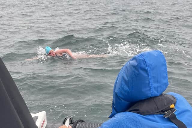 Every member of the team swam their hearts out while their coach shouted support from the boat. Pic contributed by Gail Pedlow