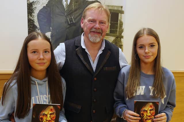 Colin Urwin with his granddaughters