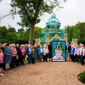Mayor of Antrim and Newtownabbey Borough Council, Cllr Mark Cooper, joined with members of Monkstown Over 50s Group as they showcased their portrait of King Charles III at the Coronation Garden at Hazelbank Park. (Contributed).