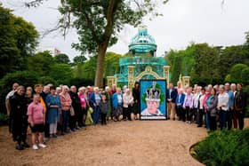 Mayor of Antrim and Newtownabbey Borough Council, Cllr Mark Cooper, joined with members of Monkstown Over 50s Group as they showcased their portrait of King Charles III at the Coronation Garden at Hazelbank Park. (Contributed).