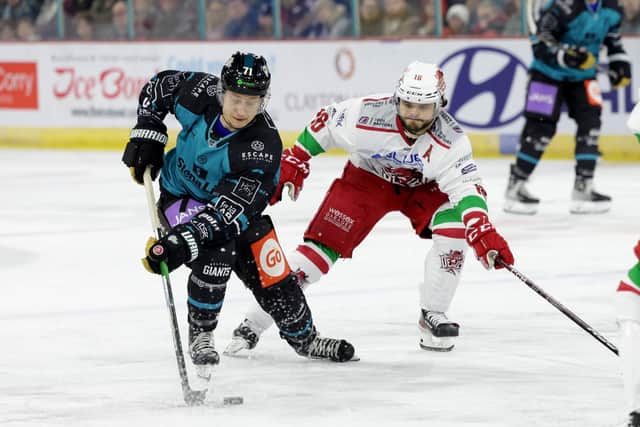 Belfast Giants’ Tyler Soy with Cardiff Devils’ Sam Duggan during Sunday afternoons Elite Ice Hockey League game at the SSE Arena, Belfast    Photo by William Cherry/Presseye