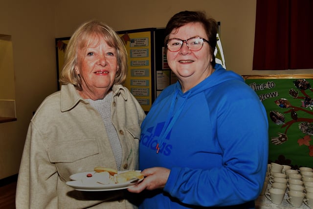 Having a bun at the Epworth Playgroup 10th anniversary coffee morning are, Lyn Boyd, left, and Diane Berry. PT48-236.