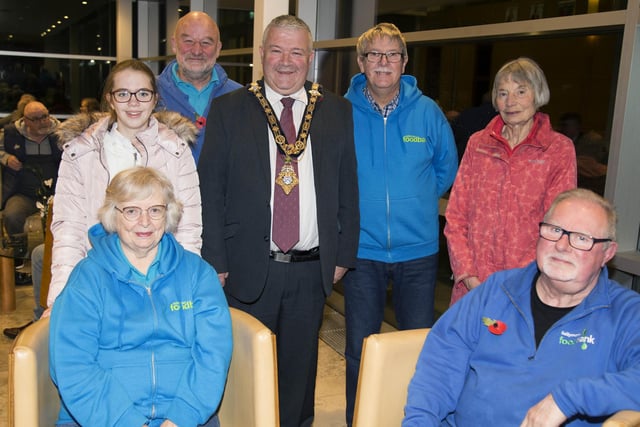 The Mayor of Causeway Coast and Glens Borough Council Councillor Ivor Wallace pictured with representatives from Ballymoney Food Bank at the event in Cloonavin