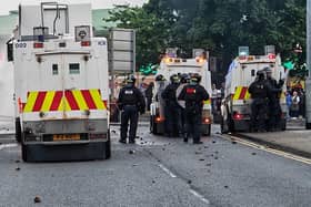 Police responding to disorder in Ballymena last month. Photo: Pacemaker