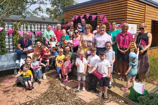 Families and staff from Harpur's Hill Children and Family Centre in Coleraine with Iain McAfee, Funding Officer for The National Lottery Community Fund in the Causeway Coast and Glens area. Credit: National Funding