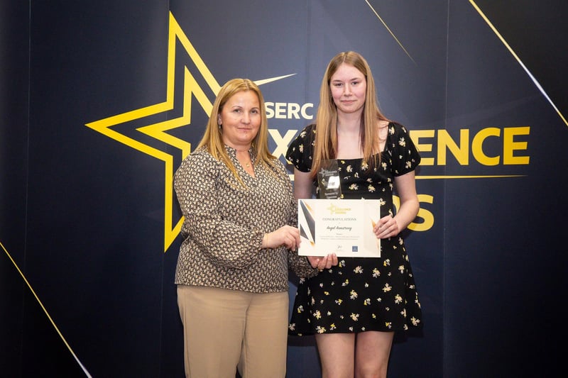 Khadine Benkirane-Long from sponsor Greenview presents Angel Armstrong, Trainee of the Year for School of School of Business, Health & Hospitality.