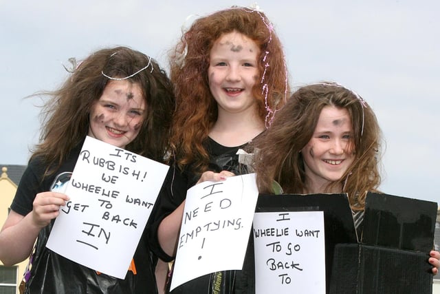 Alice Coulter, Amy Cairns and Simone Murphy as the 'Bin Men on Strike' pictured during the Red Sails Festival parade through Portstewart in 2008. Credit NI World
