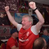 This Larne fan can't contain his excitement while watching the Glentoran v Linfield match on Wednesday night which set the Inver men up to clinch the Gibson Cup for the first time tonight (Friday, April 14) if they avoid defeat against Crusaders. Picture: Pacemaker