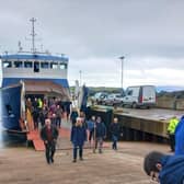 Men's Shed members arrive on Rathlin