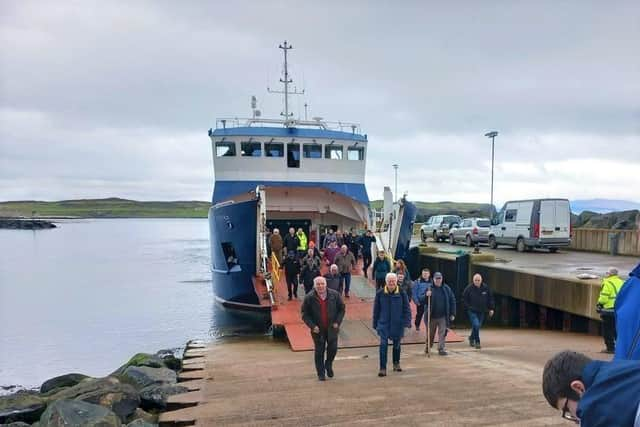 Men's Shed members arrive on Rathlin