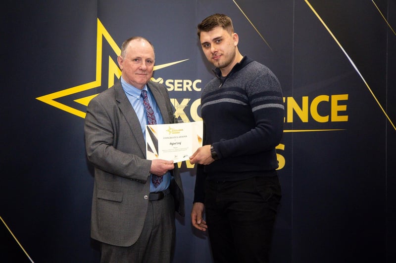 John Nugent, Chair, SERC Governing Body, with Rafael Lorf, Apprentice of the Year for School of Engineering and Science