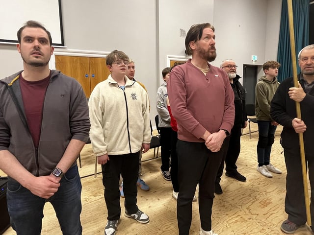 Pictured in rehearsals for Ballywillan Drama Group's production of Fiddler on the Roof are Adam Goudy (left) and Alan McClarty (second from right).