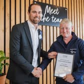 Steven Thompson pictured receiving is award from M&S Agriculture Manager, Peter Kennedy.