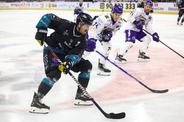 Belfast Giants’ Ben Lake with Glasgow Clan’s Darien Kielb during Sunday’s Challenge Cup game at the SSE Arena, Belfast. Photo by William Cherry/Presseye