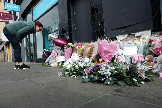 Some of the tributes left at High Street in Carrickfergus following the death of eight-year-old Scarlett Rossborough from Larne. Picture: Press Eye