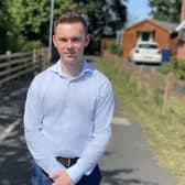 Alliance Upper Bann MLA Eóin Tennyson who is calling for urgent repairs to the black paths that weave between Portadown, Craigavon and Lurgan.