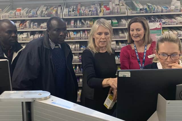 Head of Pharmacy and Medicines Management at the Ulster Hospital, Jill Macintyre guides Shadrach and Sam through their system. Pic credit: SEHSCT