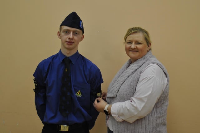 David McClelland receiving his Queen's Badge from mum Claire