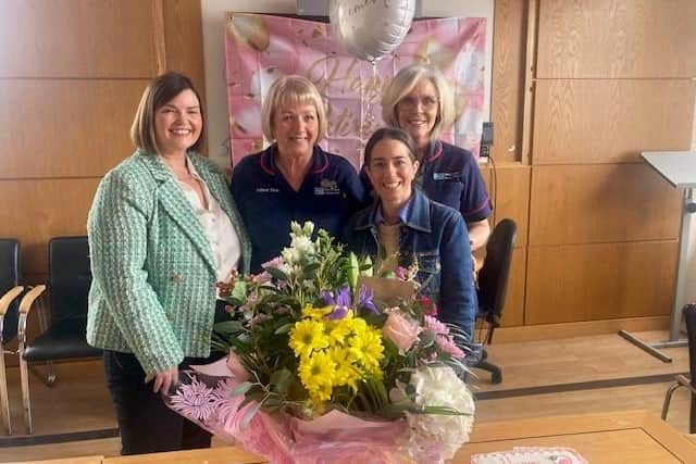 Mary celebrates her retirement with her colleagues. Pic credit: SEHSCT