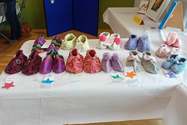 The craft section entries included knitted slippers.
