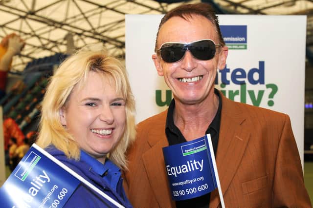 The year was 2013 ….Flying the flag for equality, were Donna Fullerton, from The Equality Commission and Sean Henry, Magherafelt Council Good Relations officer, at the Multi-Cultural Festival held at Meadowbank Sports Centre. 