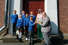 Stuart Cahoon has delivered stationery hampers to a number of schools in Lisburn, including Lisburn Central PS. (Pic: Contributed).