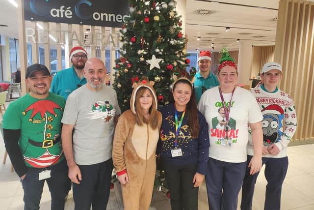 Patient experience staff, including porters and catering team donned their finest festive attire to fundraise for Save The Children as part of Christmas Jumper Day 2023. Pic credit: SEHSCT