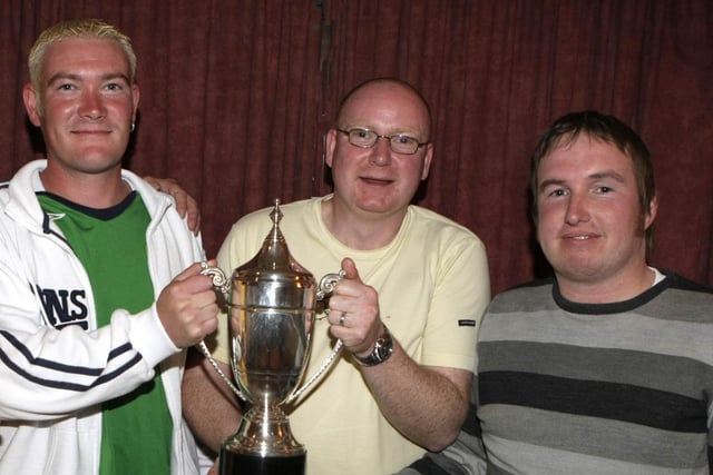 Players from McKillops, who finished third in the Ballymoney Darts League with their trophy in 2008