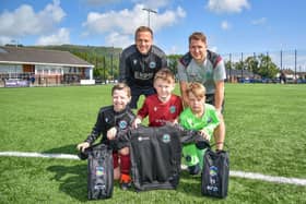 Three aspiring young footballers from Greenisland FC 2014s.
