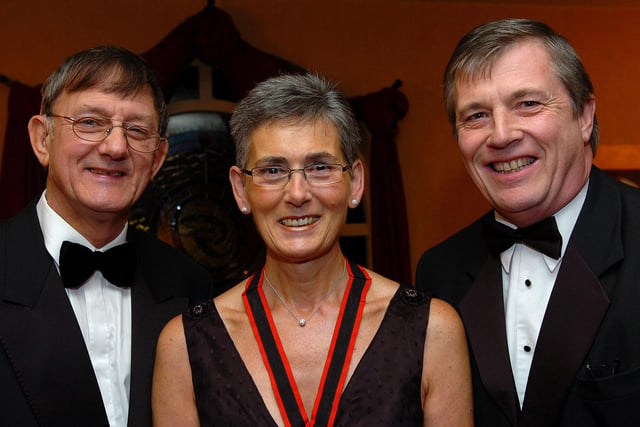 Margaret Hamilton, president of the Rainey Old Pupils Association with special guest Carl Monteith and her husband Keith at the Association's annual formal in 2007.