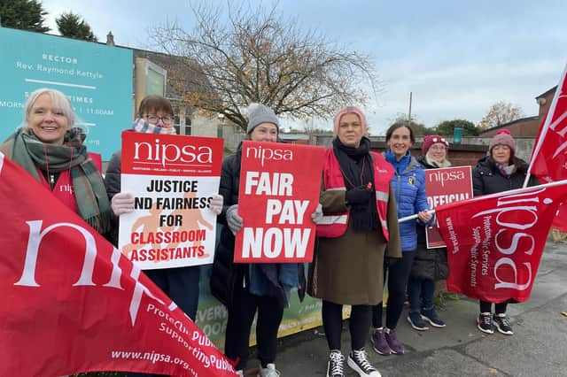 Workers on the picket line at Carrick PS in Lurgan, Co Armagh. Hundreds of school support staff from unions such as Unison, Unite, GMB and NIPSA joined the strike on the second day in what will be one of the biggest strikes among non-teaching unions in years. The ongoing industrial dispute is over the failure to deliver a pay and grading review to education workers as part of a negotiated resolution of the 2022 pay dispute.