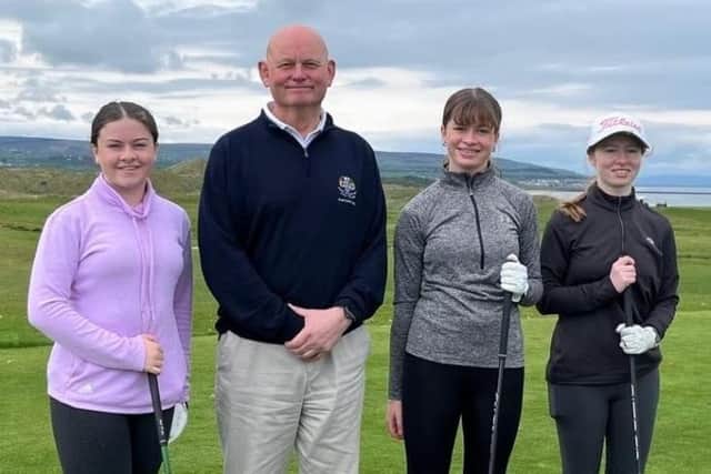 The talented trio of golfing Wilson sisters Aimee, Caitlin and Lauren with Captain of Portstewart Golf Club, Neil Morrison. Credit Portstewart Golf Club