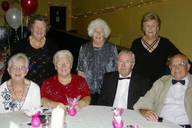 A party enjoying the charity fundraiser at Whitehead Community Centre in 2007.