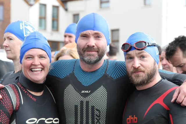 Three of the 300 participants in this year's Carrickfergus Castle Triathlon.
