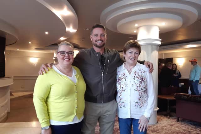 Former Boyzone and Coronation Street star Keith Duffy flew in from Dubai to award Portadown woman Julia McKeever with a special community champion award for her work in autism. Also in the photo is Dierdre Duffy.