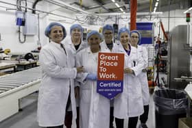 Chief People Officer, Gillian McAuley celebrates the achievement with production colleagues. CREDIT EAKIN HEALTHCARE
