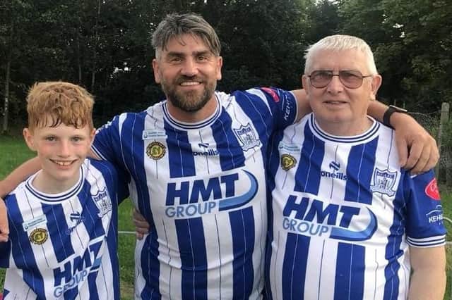 It runs in the family... John McClelland (centre) pictured with his father and his son in their Newry City jerseys.