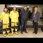 The Mayor welcomes local members of the RNLI to the Cloonavin to mark 200 years of the institution. Credit Causeway Coast and Glens Council.