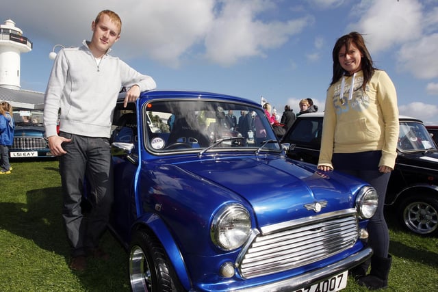 Philip Crone and Alex Robson pictured with their Mini at the Causeway Coast Mini Festival at the Dunluce Centre Portrush in 2009