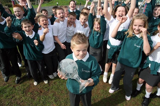 Johnathon Pierce pictured with the Ulster Star Penalty Kick Competition trophy at Meadow Bridge Primary School in 2006